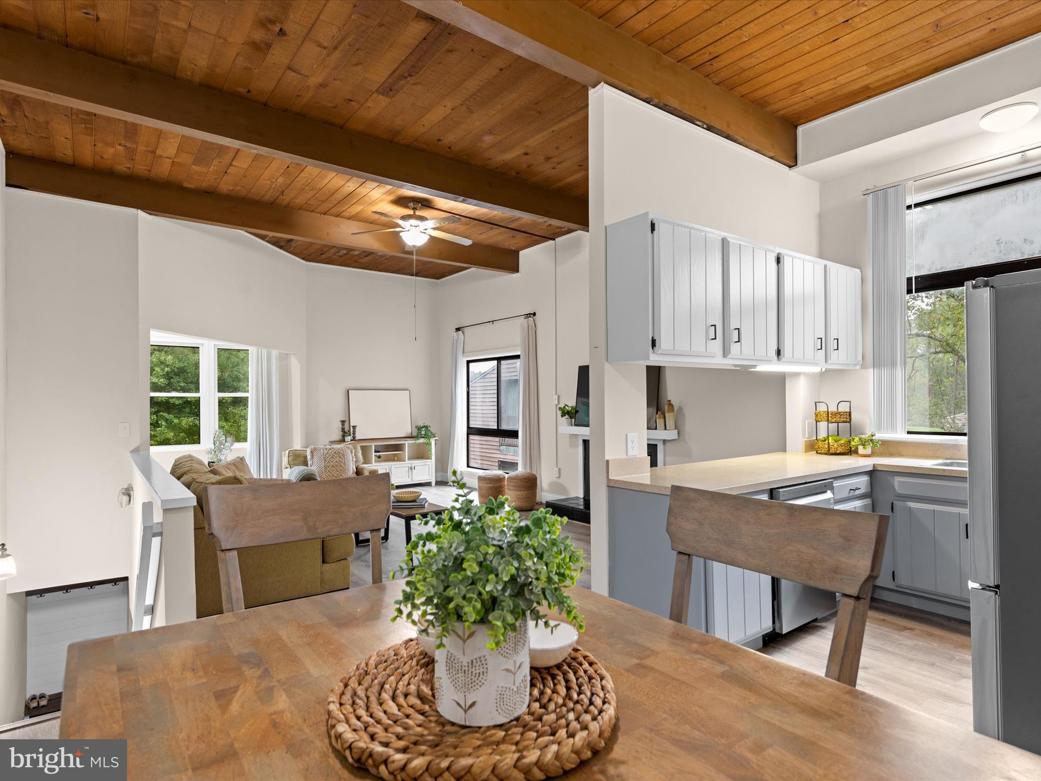438 Ocean Parkway, Unit 4 Berlin, MD 21811 - Photo 78 of 81 a room with stainless steel appliances kitchen island granite countertop furniture and a kitchen view