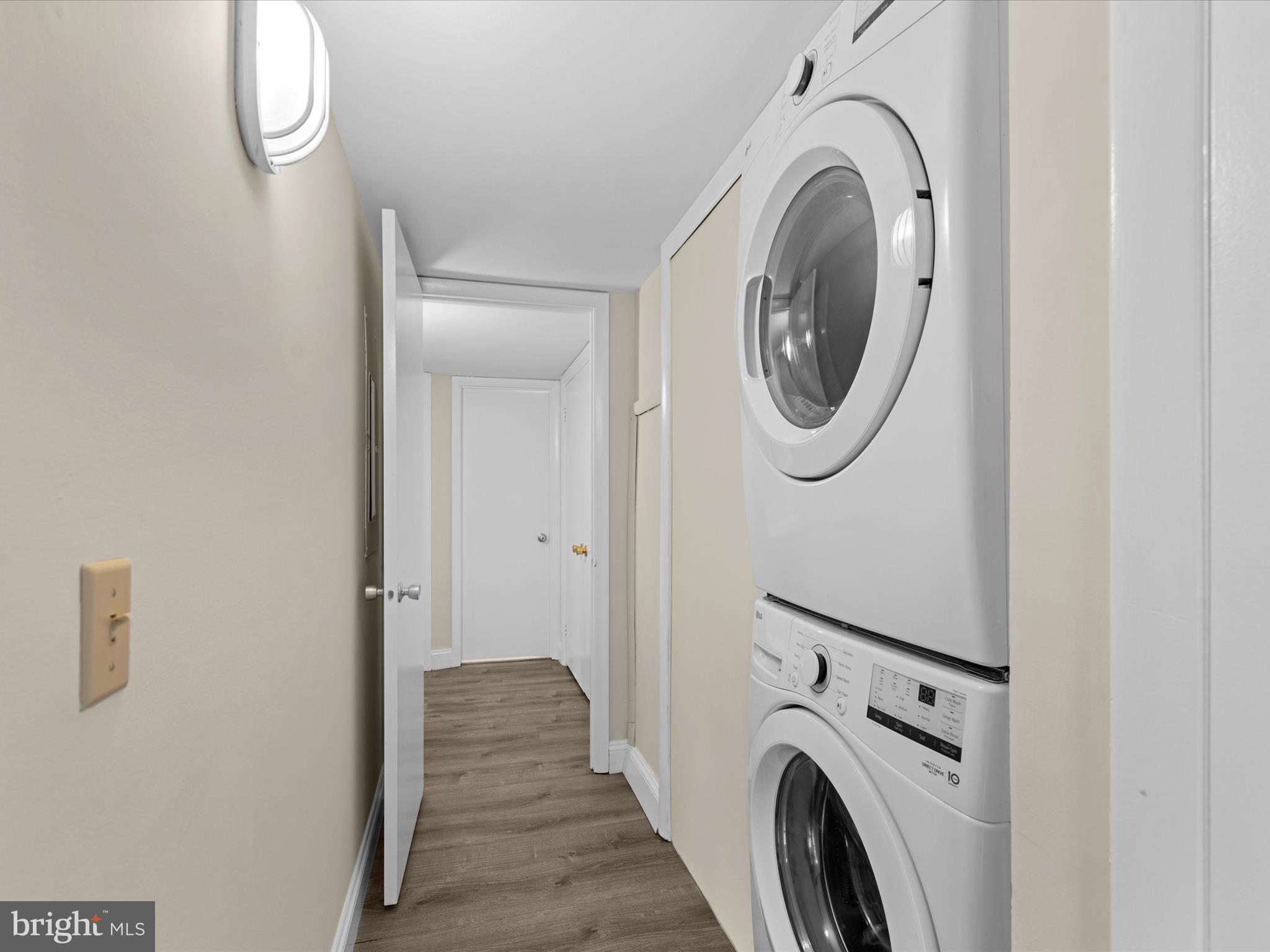 438 Ocean Parkway, Unit 4 Berlin, MD 21811 - Photo 41 of 81 a view of a storage and utility room with washer and dryer