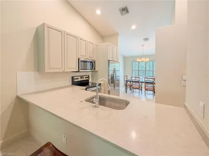 $295,000 | 3510 Avion Woods Court, Unit 104, Naples, FL 34104