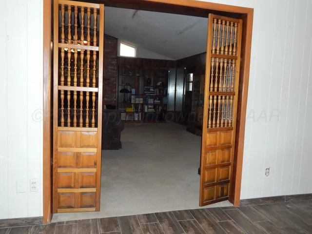 a view of livingroom with furniture and staircase