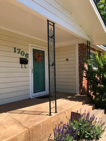 a view of a entryway door front of house