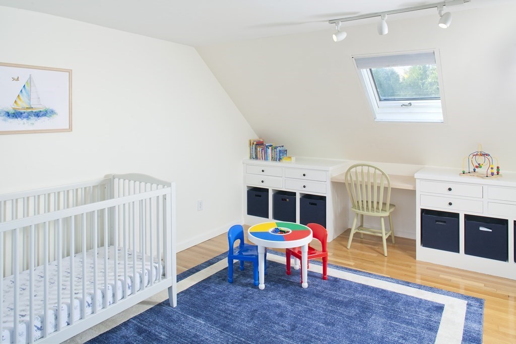 4 Polk Road Hingham, MA 02043 - Photo 11 of 21 a view of a room with furniture and wooden floor