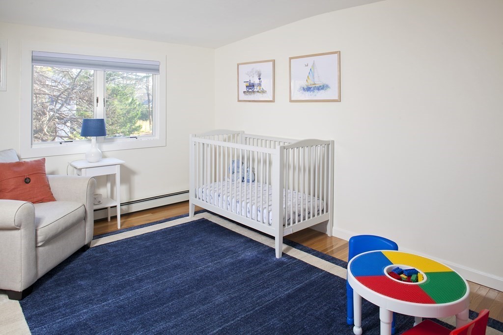 4 Polk Road Hingham, MA 02043 - Photo 12 of 21 a bedroom with a bed and a window