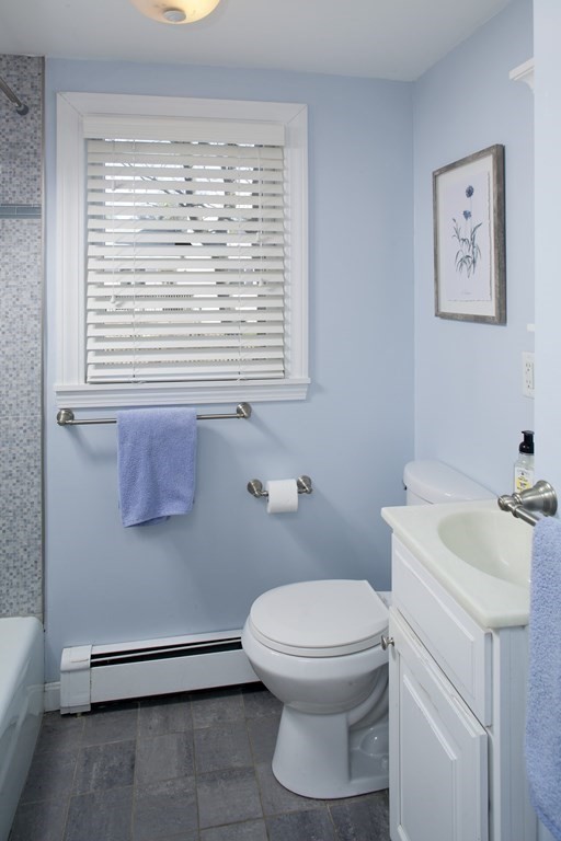 4 Polk Road Hingham, MA 02043 - Photo 6 of 21 a bathroom with a toilet a sink and a window
