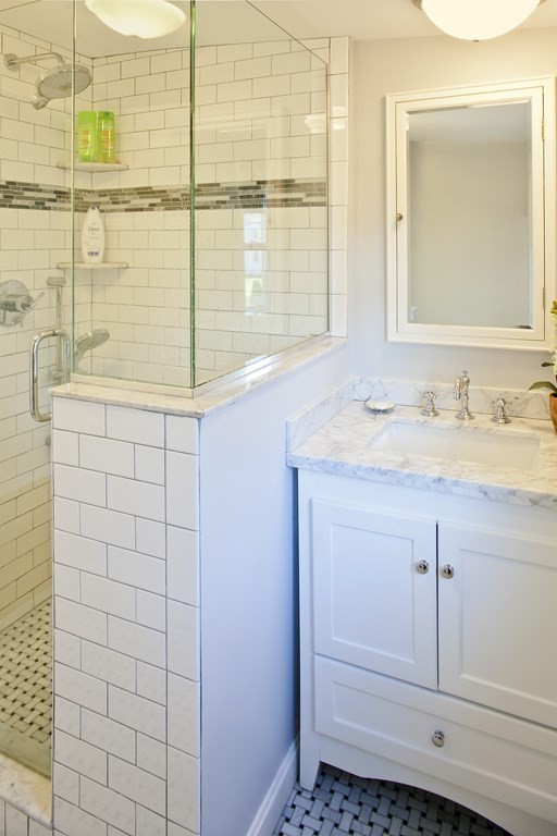 4 Polk Road Hingham, MA 02043 - Photo 9 of 21 a bathroom with a sink and a mirror