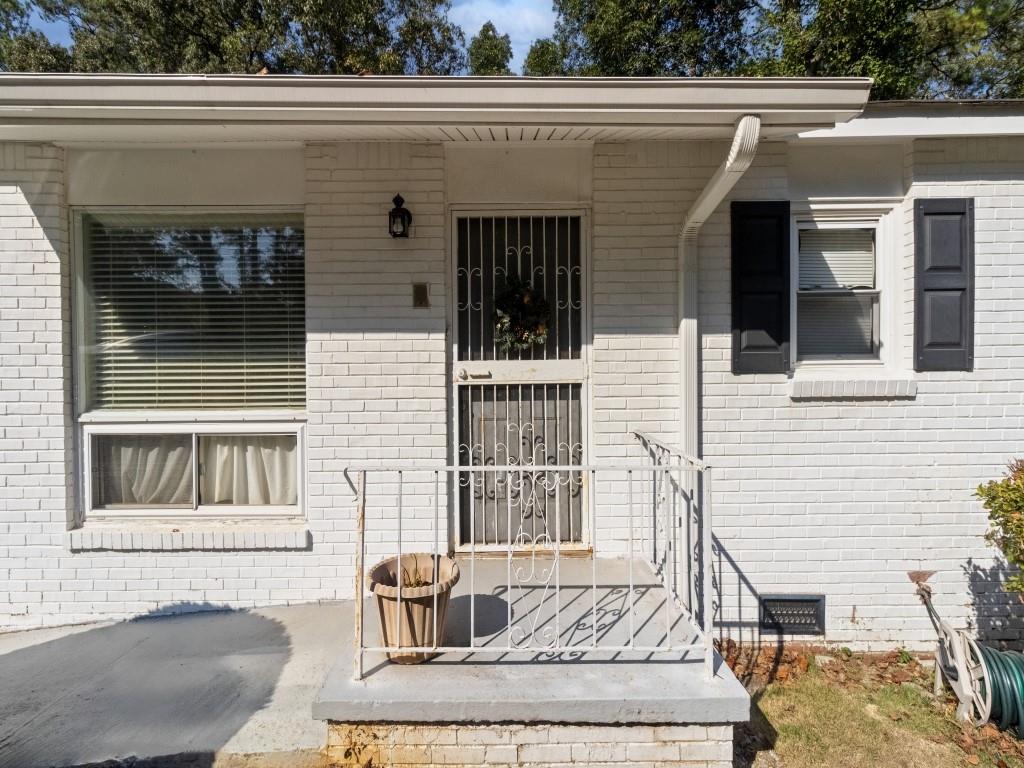 3751 Amber Road Northwest Atlanta, GA 30331 - Photo 1 of 1 a front view of a house with a yard