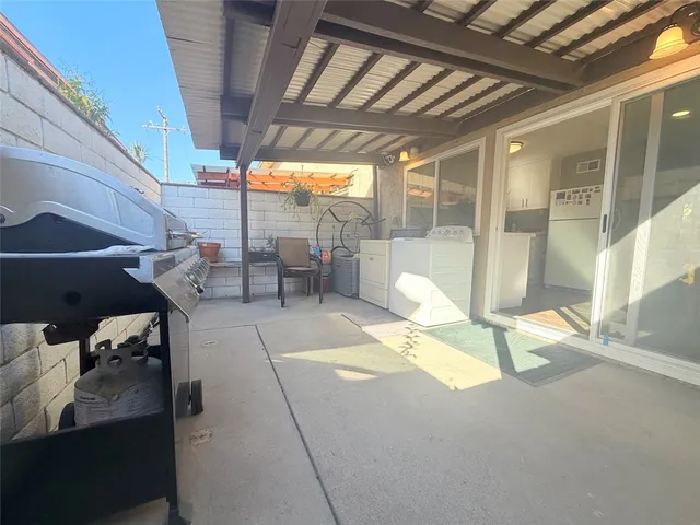 a view of a porch with furniture
