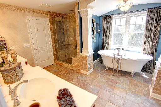 24145 West Milton Road Hawthorn Woods, IL 60047 - Photo 13 of 16 a spacious bathroom with a bathtub and sink