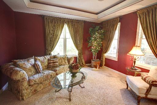 24145 West Milton Road Hawthorn Woods, IL 60047 - Photo 3 of 16 a living room with furniture and a large window