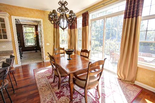 24145 West Milton Road Hawthorn Woods, IL 60047 - Photo 9 of 16 a dining room with furniture window and wooden floor