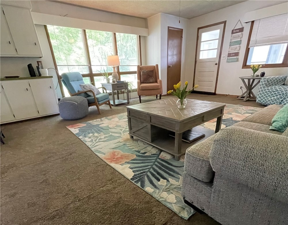 360 Ridge Street Piqua, OH 45356 - Photo 28 of 46 This inviting space features large windows and a welcoming ambiance.