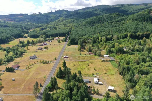an aerial view of residential house with outdoor space