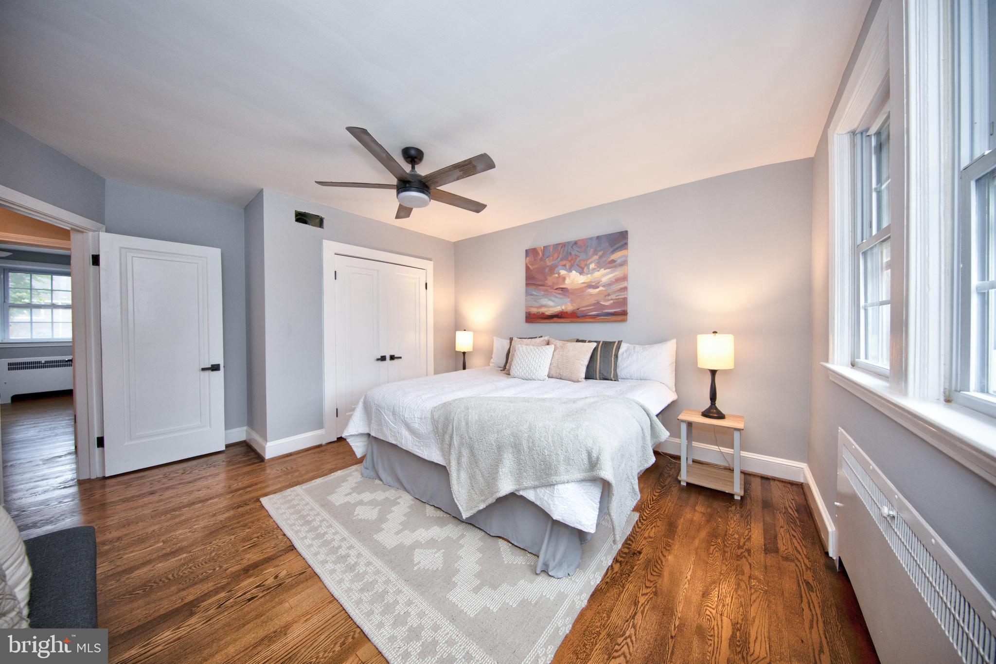416 Dunkirk Road Baltimore, MD 21212 - Photo 17 of 33 a spacious bedroom with a bed and wooden floor