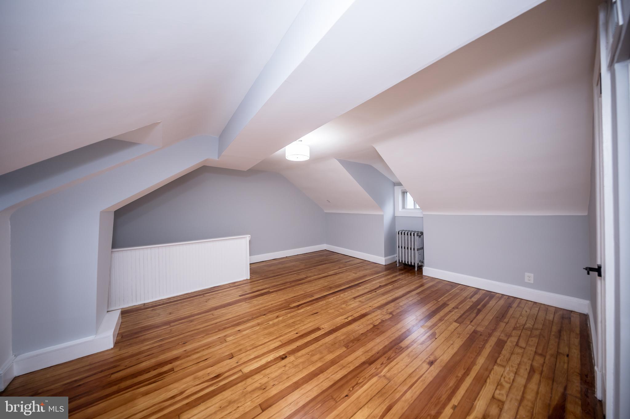 416 Dunkirk Road Baltimore, MD 21212 - Photo 23 of 33 a view of empty room with wooden floor