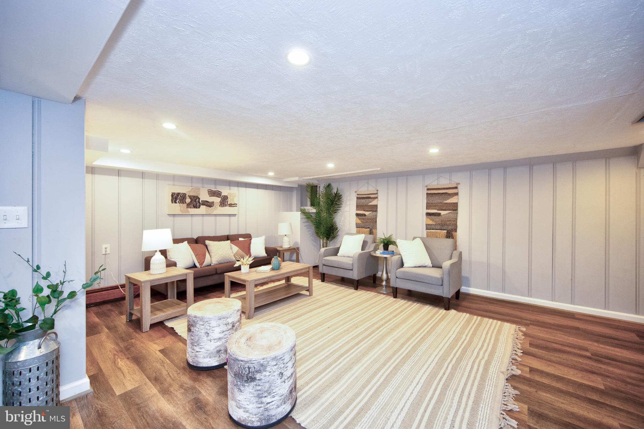 416 Dunkirk Road Baltimore, MD 21212 - Photo 24 of 33 a living room with furniture and a wooden floor