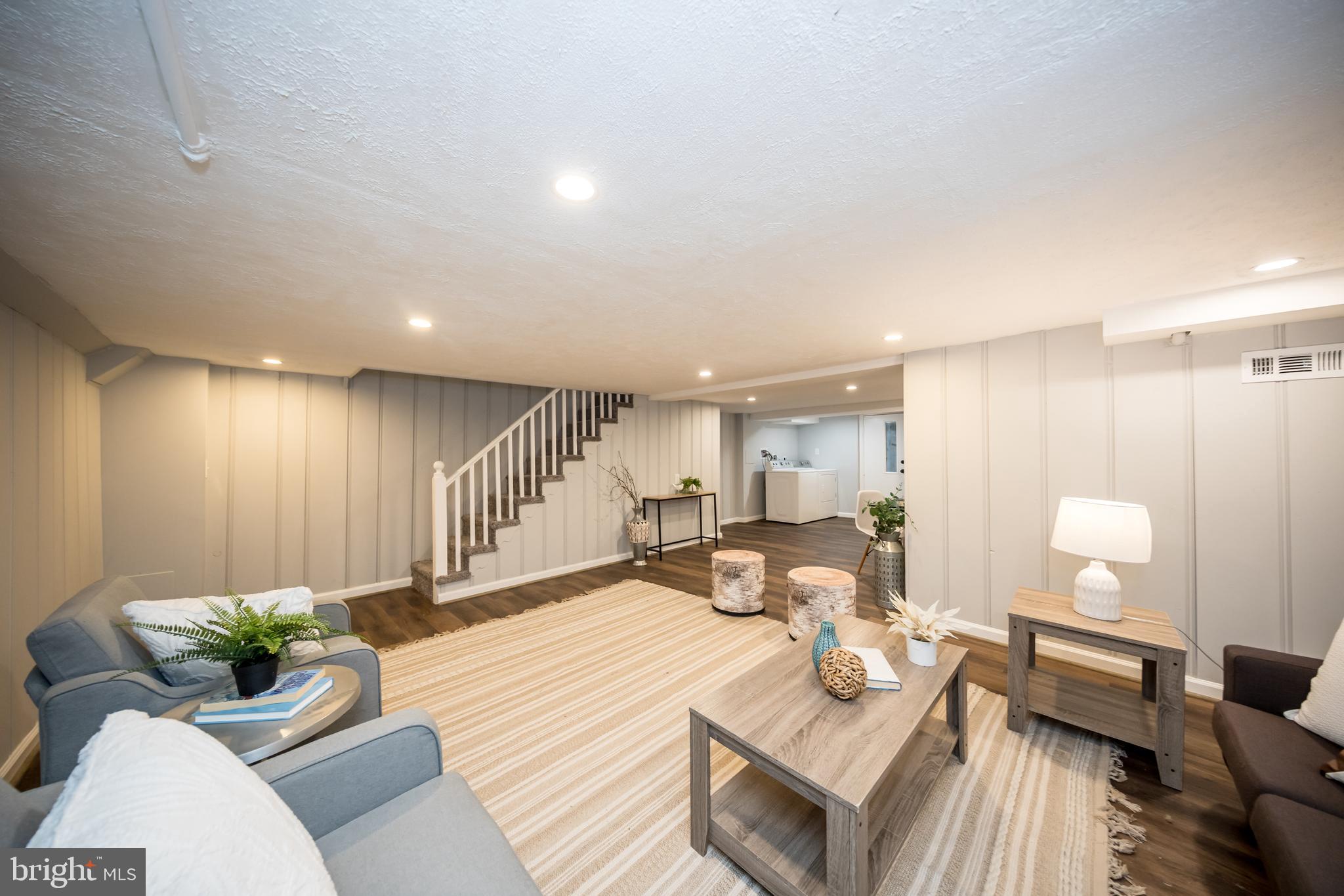 416 Dunkirk Road Baltimore, MD 21212 - Photo 26 of 33 a living room with furniture and a table