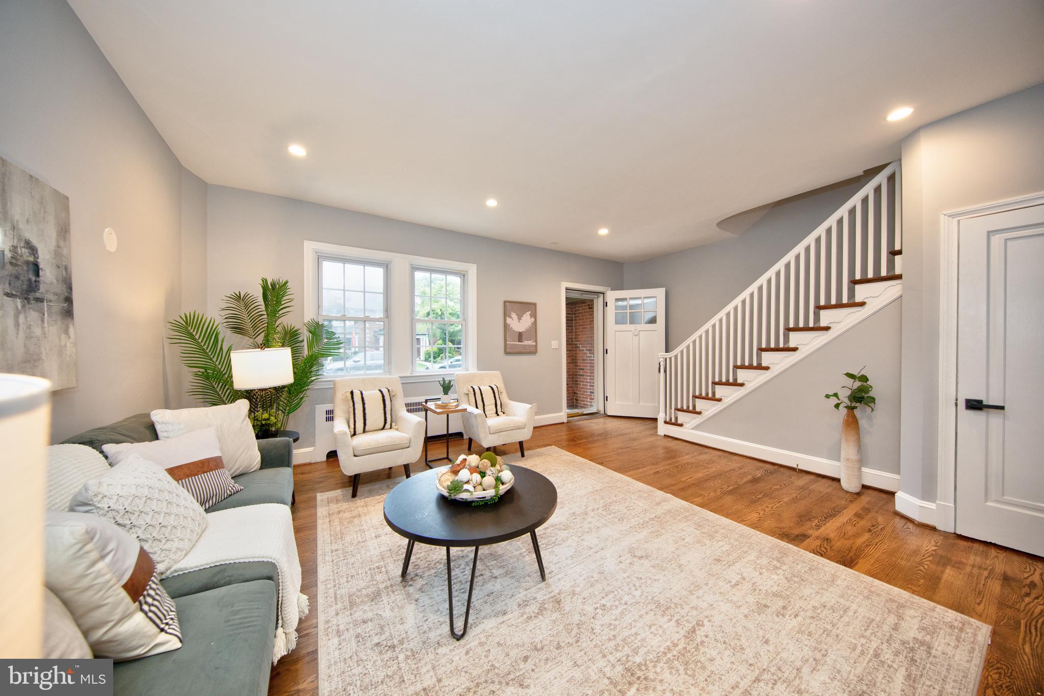 416 Dunkirk Road Baltimore, MD 21212 - Photo 5 of 33 a living room with furniture and a wooden floor