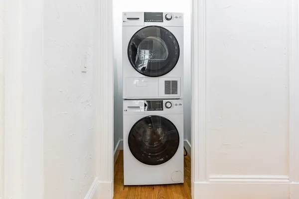 a view of washer and dryer in a utility room