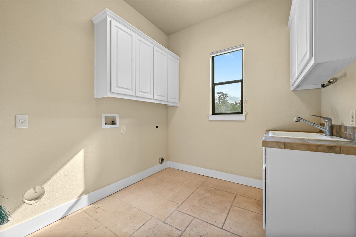 351 Hawthorne Loop Driftwood, TX 78619 - Photo 27 of 39 a view of storage and utility room with closet