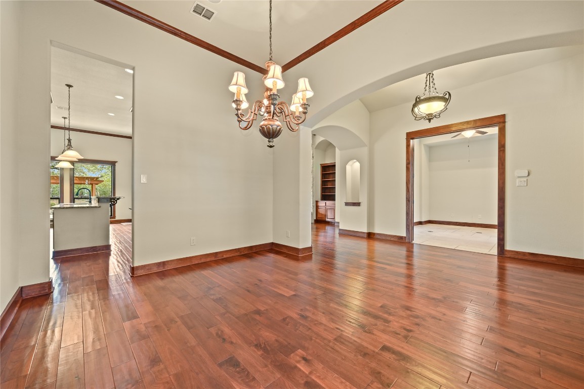 351 Hawthorne Loop Driftwood, TX 78619 - Photo 7 of 39 a view of a livingroom with wooden floor