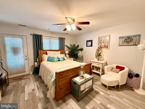 a bed room with a bed and a window