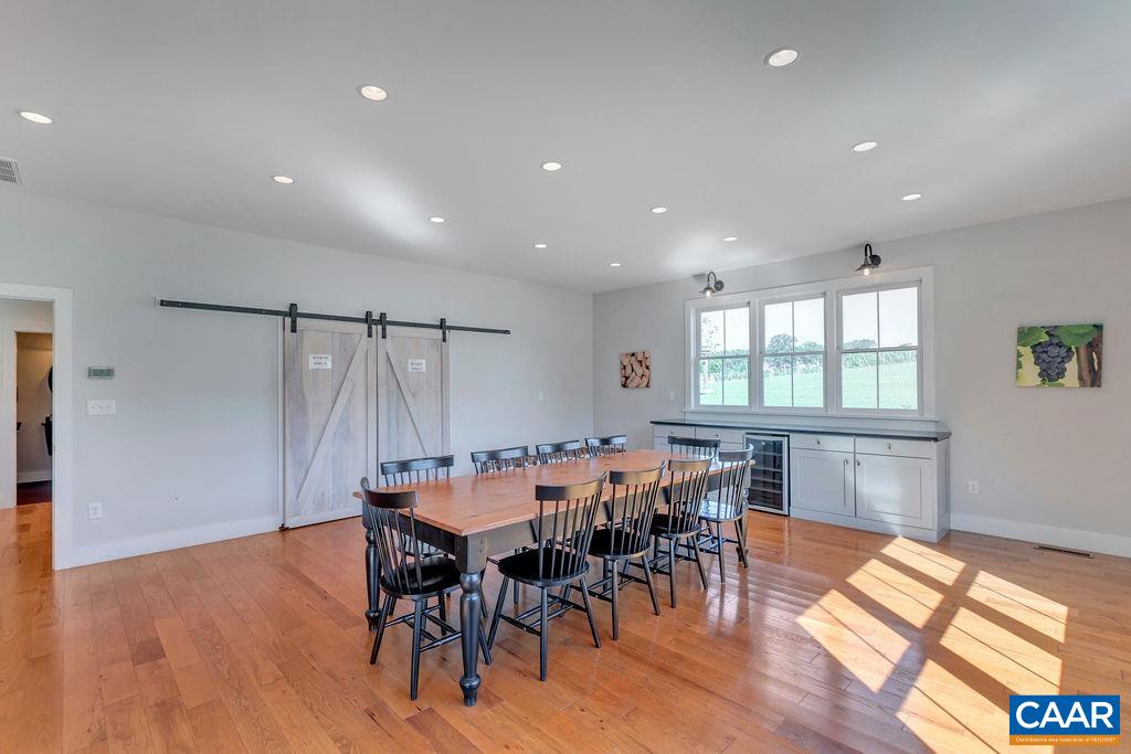 3304 A Ruritan Lake Road Palmyra, VA 22963 - Photo 24 of 37 a dining room with furniture window and wooden floor