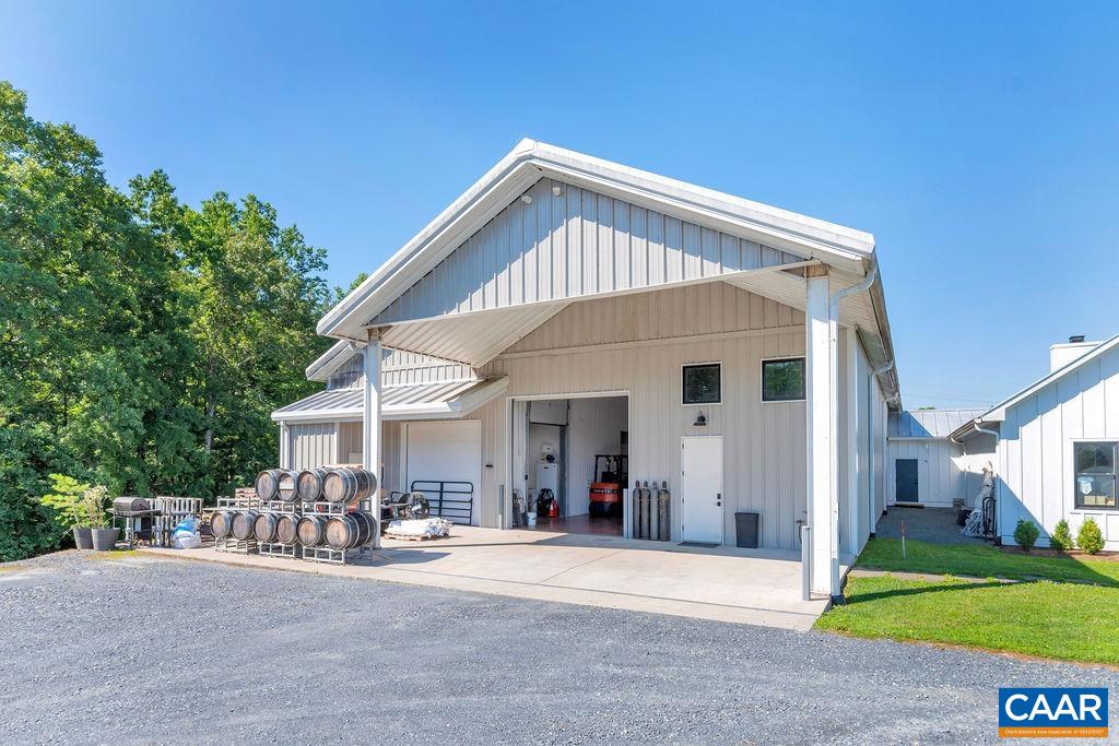 3304 A Ruritan Lake Road Palmyra, VA 22963 - Photo 32 of 37 a view of a house with porch and garden