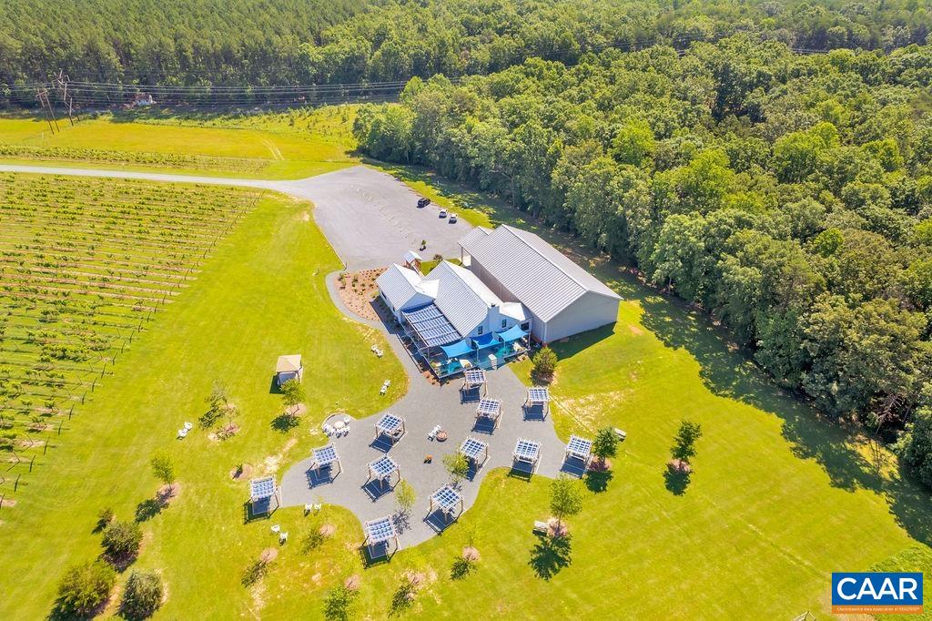 3304 A Ruritan Lake Road Palmyra, VA 22963 - Photo 7 of 37 a view of a swimming pool with a yard