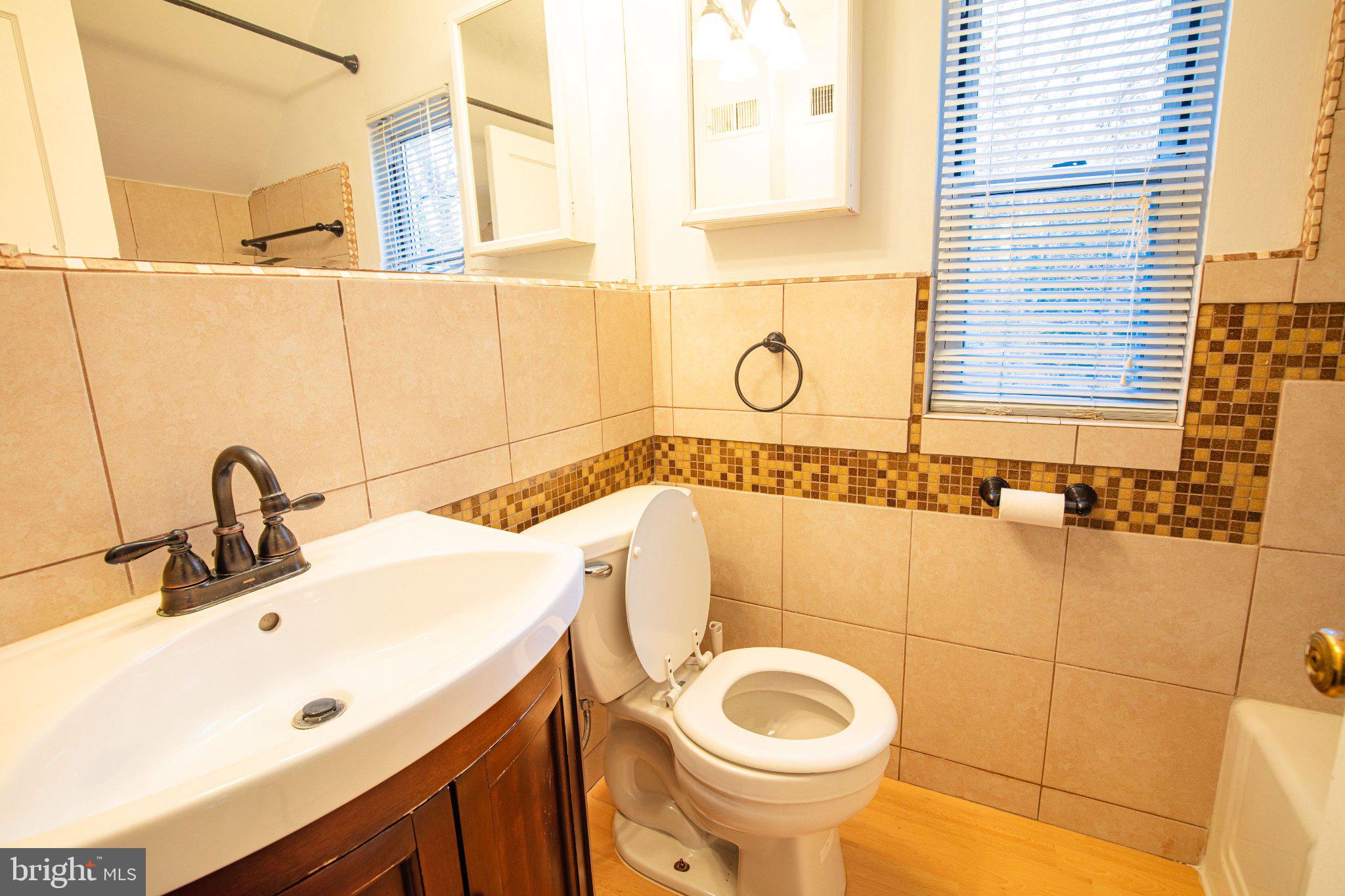 5810 Greenleaf Road Cheverly, MD 20785 - Photo 22 of 29 Modern bathroom with stylish finishes.