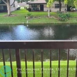 Welleby Sunrise, FL 33351 - Photo 10 of 10 a view of a back yard from a lake view