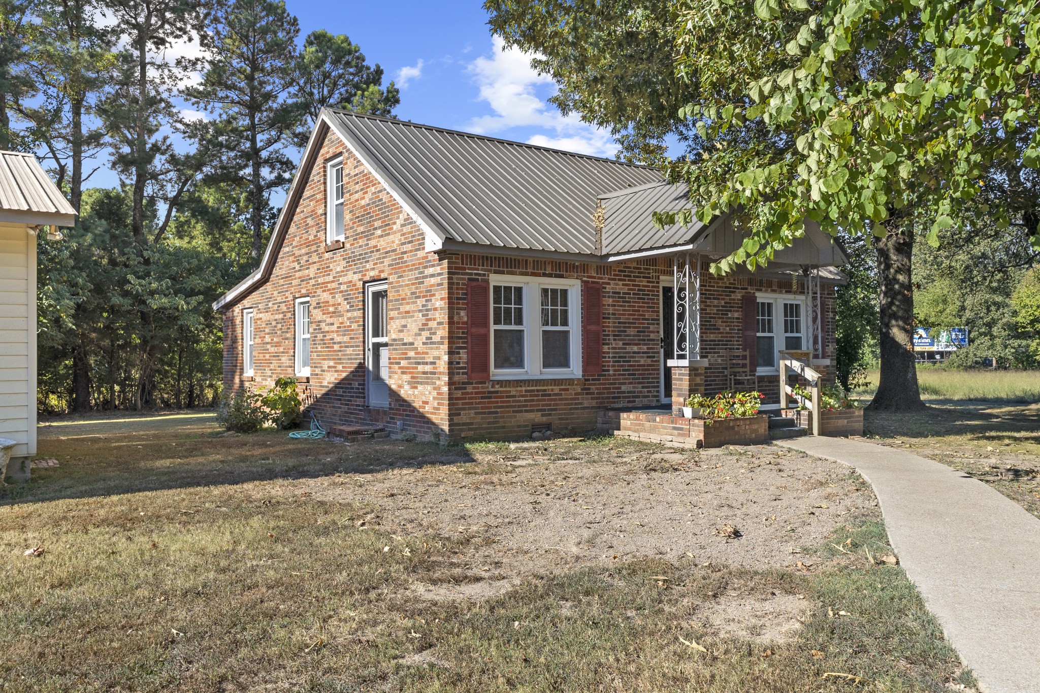 1210 Garton Road Burns, TN 37029 - Photo 18 of 32 a view of a house with backyard and sitting area