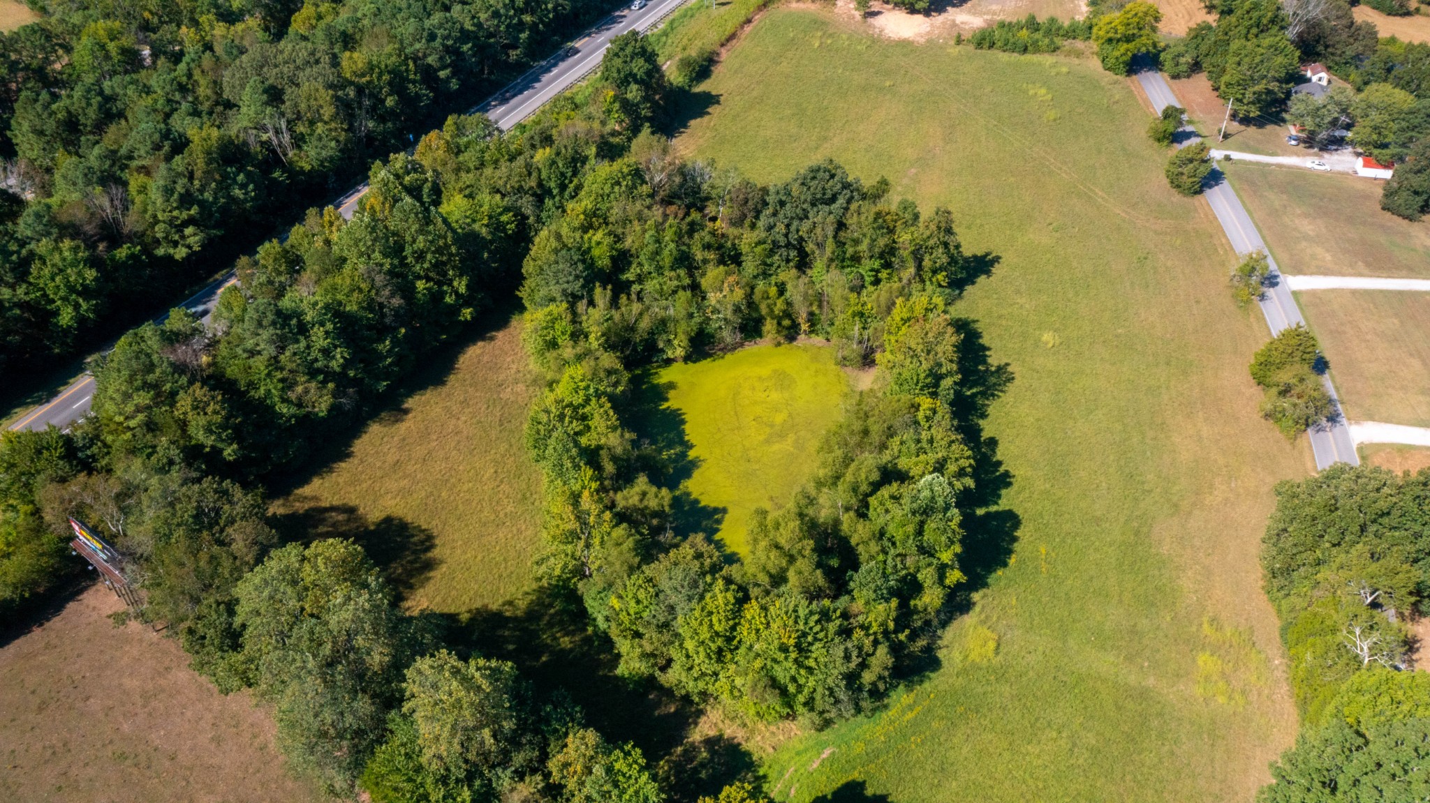 1210 Garton Road Burns, TN 37029 - Photo 10 of 32 a view of a lake with a yard