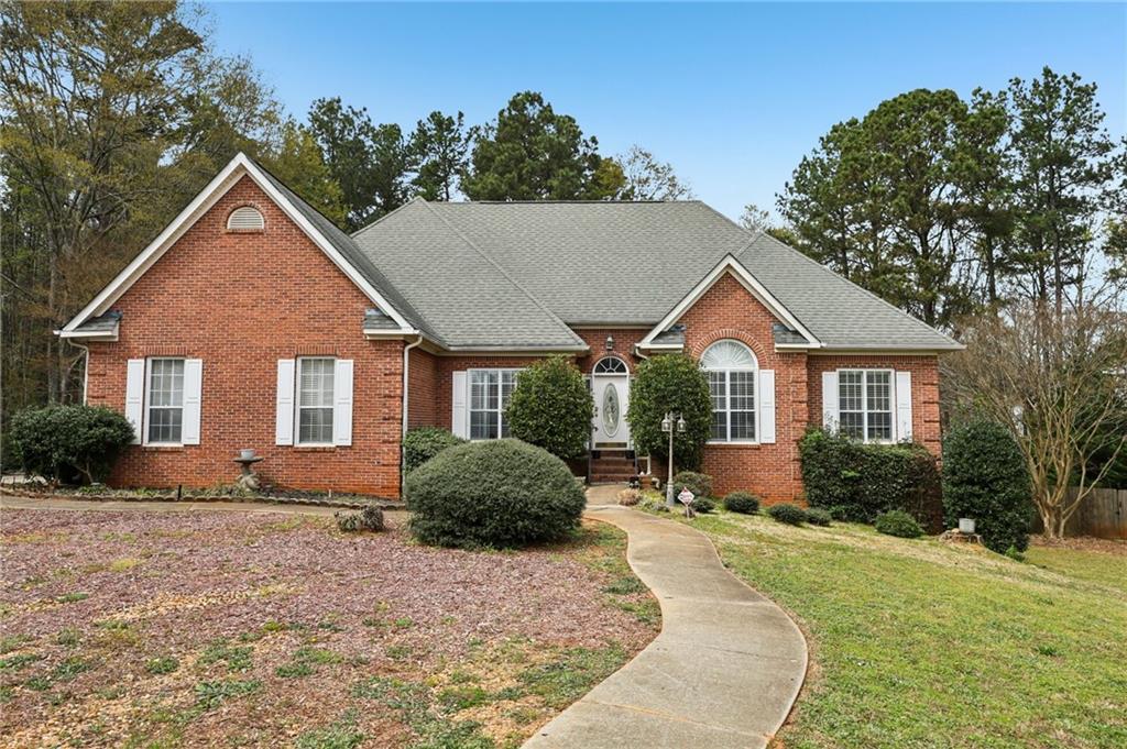 436 Lancelot Trail McDonough, GA 30252 - Photo 1 of 49 a front view of a house with a yard and outdoor seating