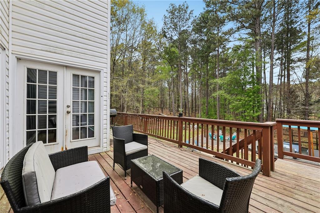 436 Lancelot Trail McDonough, GA 30252 - Photo 11 of 49 a view of a two chairs in the deck