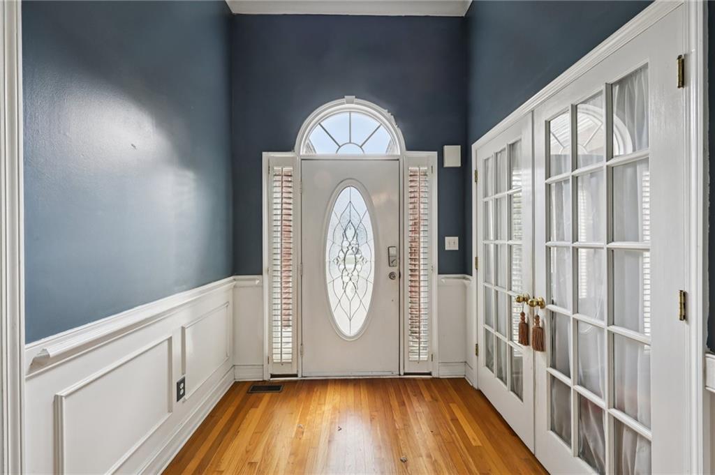 436 Lancelot Trail McDonough, GA 30252 - Photo 12 of 49 a view of a hallway with wooden floor and entryway