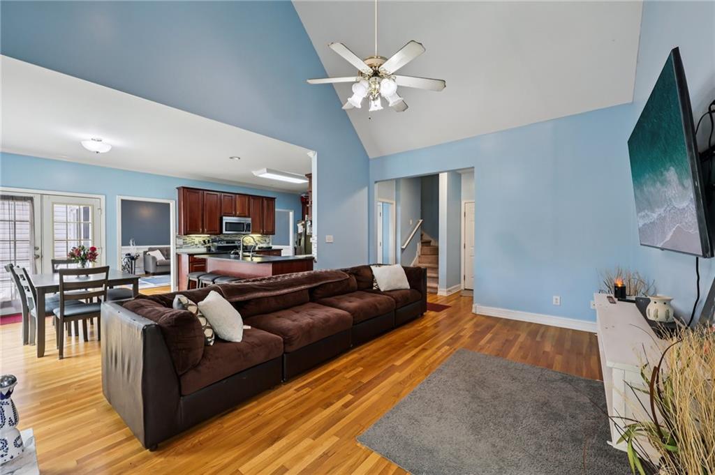 436 Lancelot Trail McDonough, GA 30252 - Photo 19 of 49 a living room with furniture and a flat screen tv