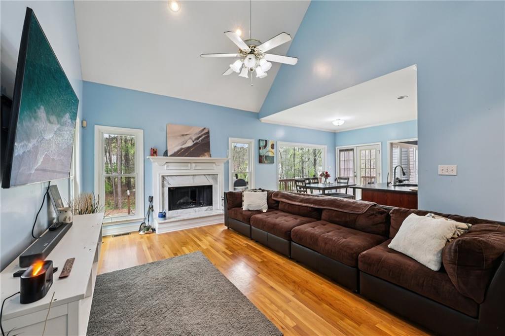 436 Lancelot Trail McDonough, GA 30252 - Photo 23 of 49 a living room with furniture and a fireplace
