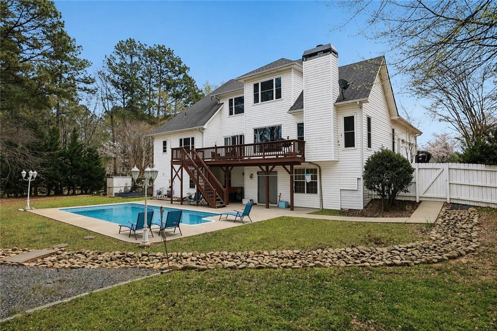 436 Lancelot Trail McDonough, GA 30252 - Photo 4 of 49 a view of a house with pool and sitting area