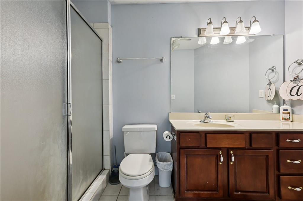436 Lancelot Trail McDonough, GA 30252 - Photo 41 of 49 a bathroom with a toilet sink and mirror