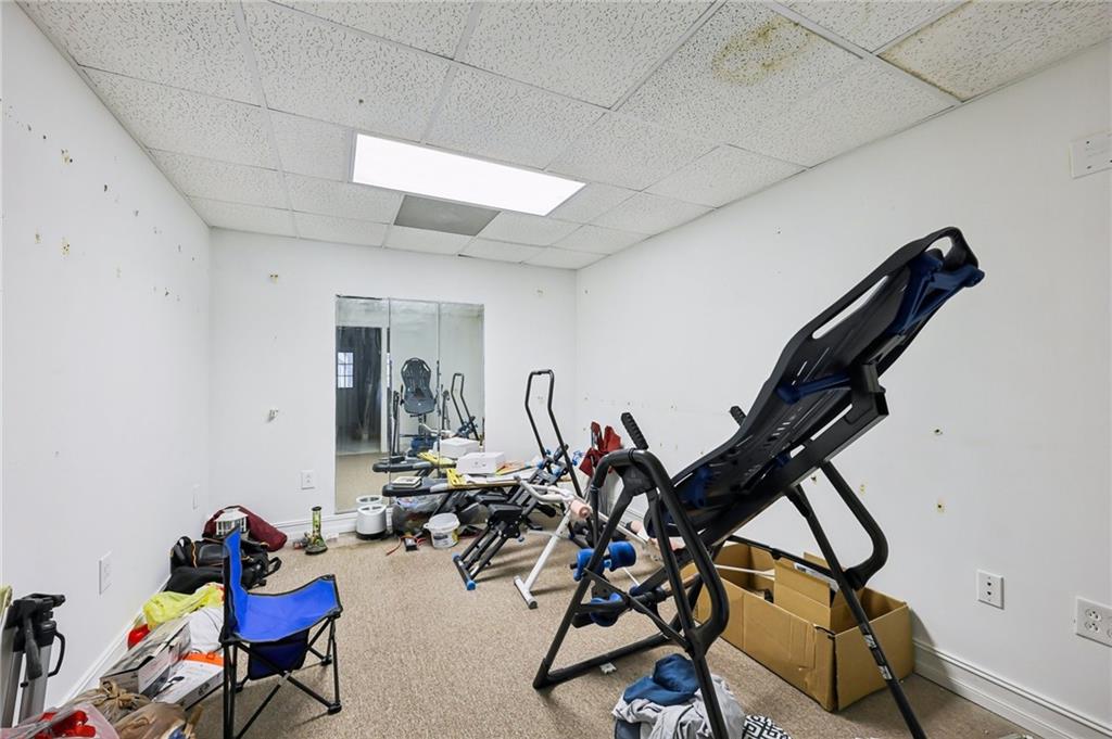 436 Lancelot Trail McDonough, GA 30252 - Photo 42 of 49 a view of a room with gym equipment