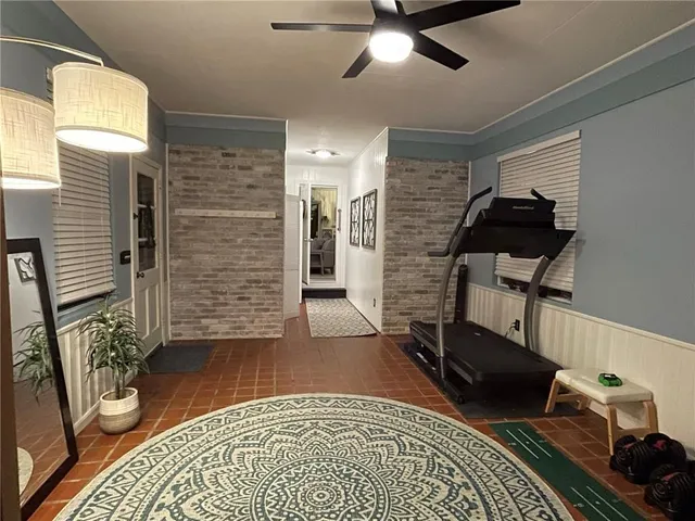 a view of a livingroom with furniture and a rug