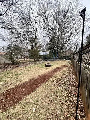 a view of yard covered with snow