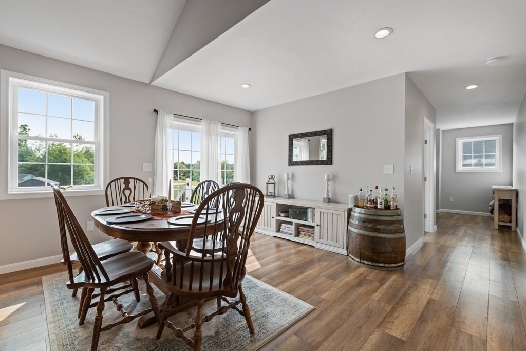 28 Black Point Road Webster, MA 01570 - Photo 14 of 42 a view of a dining room with furniture and wooden floor
