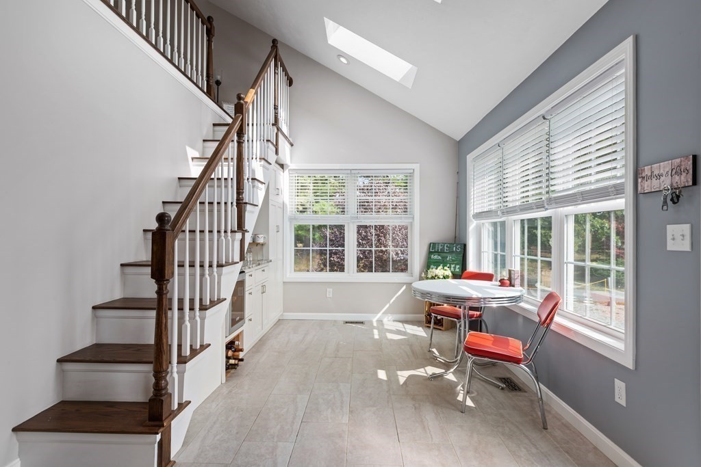 28 Black Point Road Webster, MA 01570 - Photo 15 of 42 a living room with furniture and a large window
