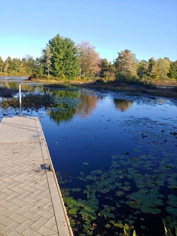 28 Black Point Road Webster, MA 01570 - Photo 41 of 42 a view of a lake with a outdoor space