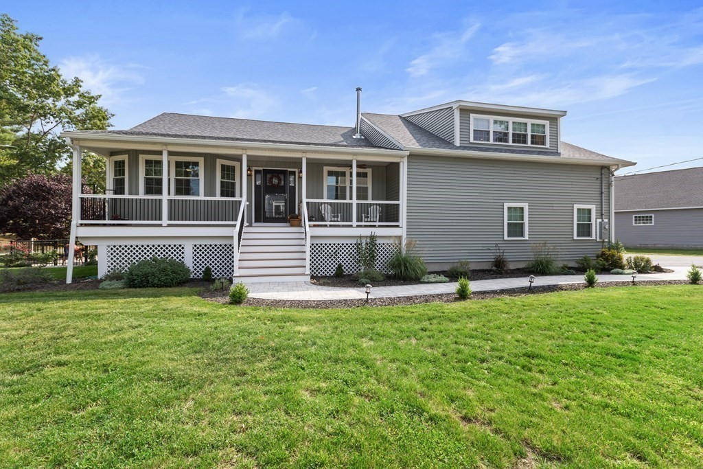 28 Black Point Road Webster, MA 01570 - Photo 42 of 42 a front view of a house with a yard
