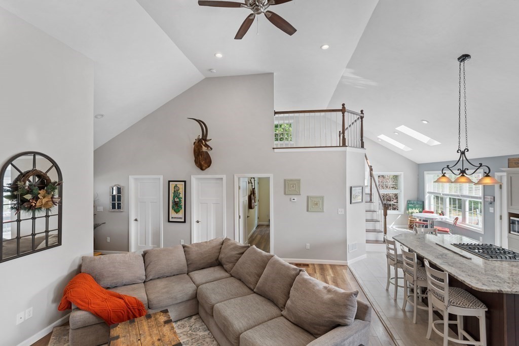 28 Black Point Road Webster, MA 01570 - Photo 8 of 42 a living room with furniture a dining table and chairs