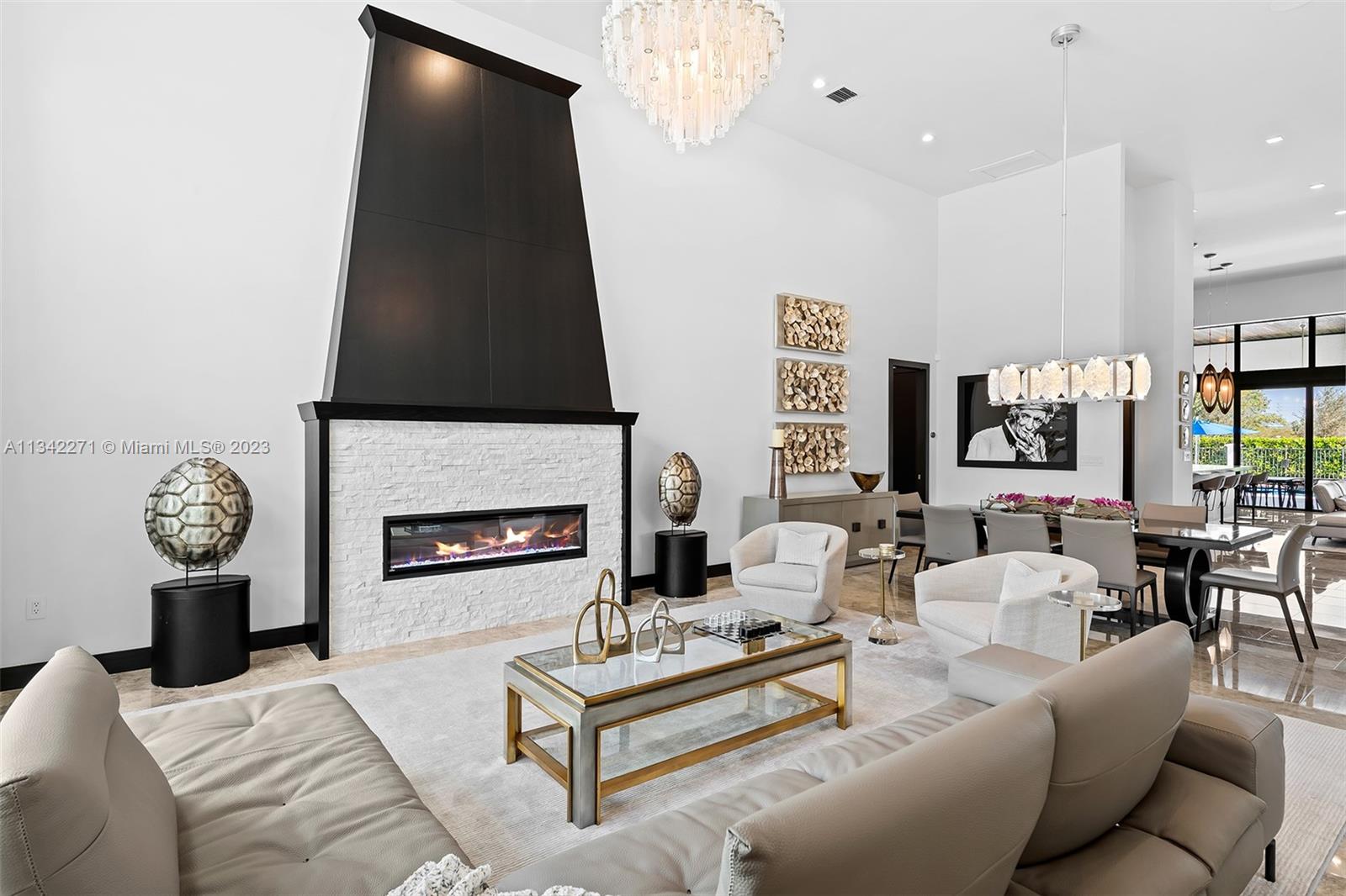 2610 Oak Park Drive Davie, FL 33325 - Photo 14 of 60 a living room with furniture a fireplace and a flat screen tv