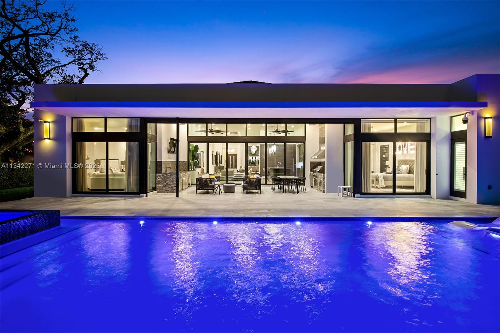 2610 Oak Park Drive Davie, FL 33325 - Photo 49 of 60 a large white building with swimming pool in front of it