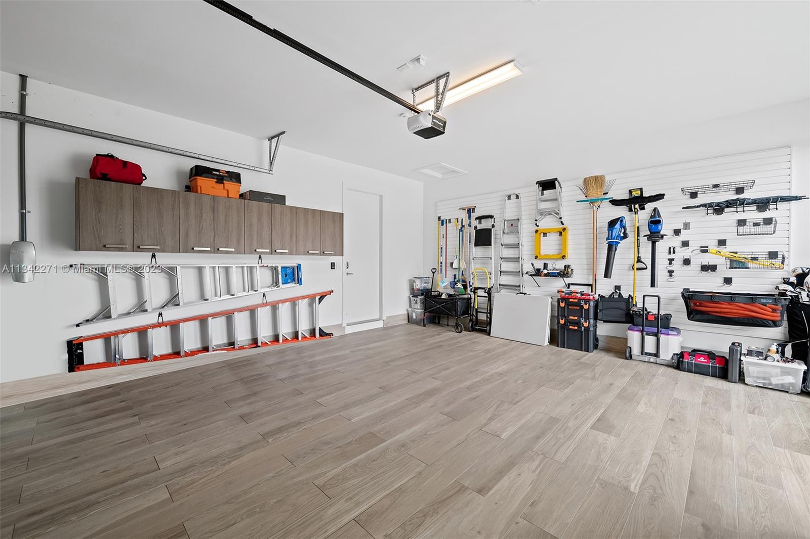 2610 Oak Park Drive Davie, FL 33325 - Photo 59 of 60 a room with lots of furniture and gym equipment